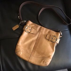 Tan coach purse